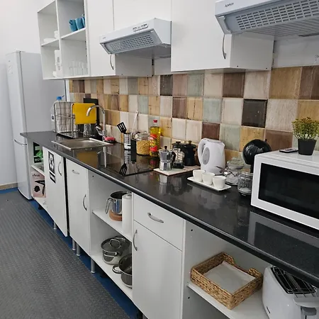 בית הארחה Blue Mango Surf House Center פוארטו דל רוסריו